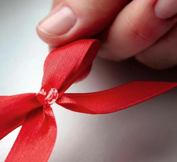 Geschenkschleifen^DecoWoerner Fertigschleifen Zum Kleben, 100 Stück rot