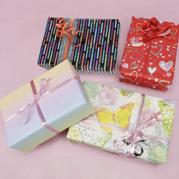 Geschenkpapier | Go Green - Nachhaltige Geschenkverpackung^DecoWoerner Nachhaltiges Geschenkpapier Bunte Herzen, , 50 Cm X 50 M rot